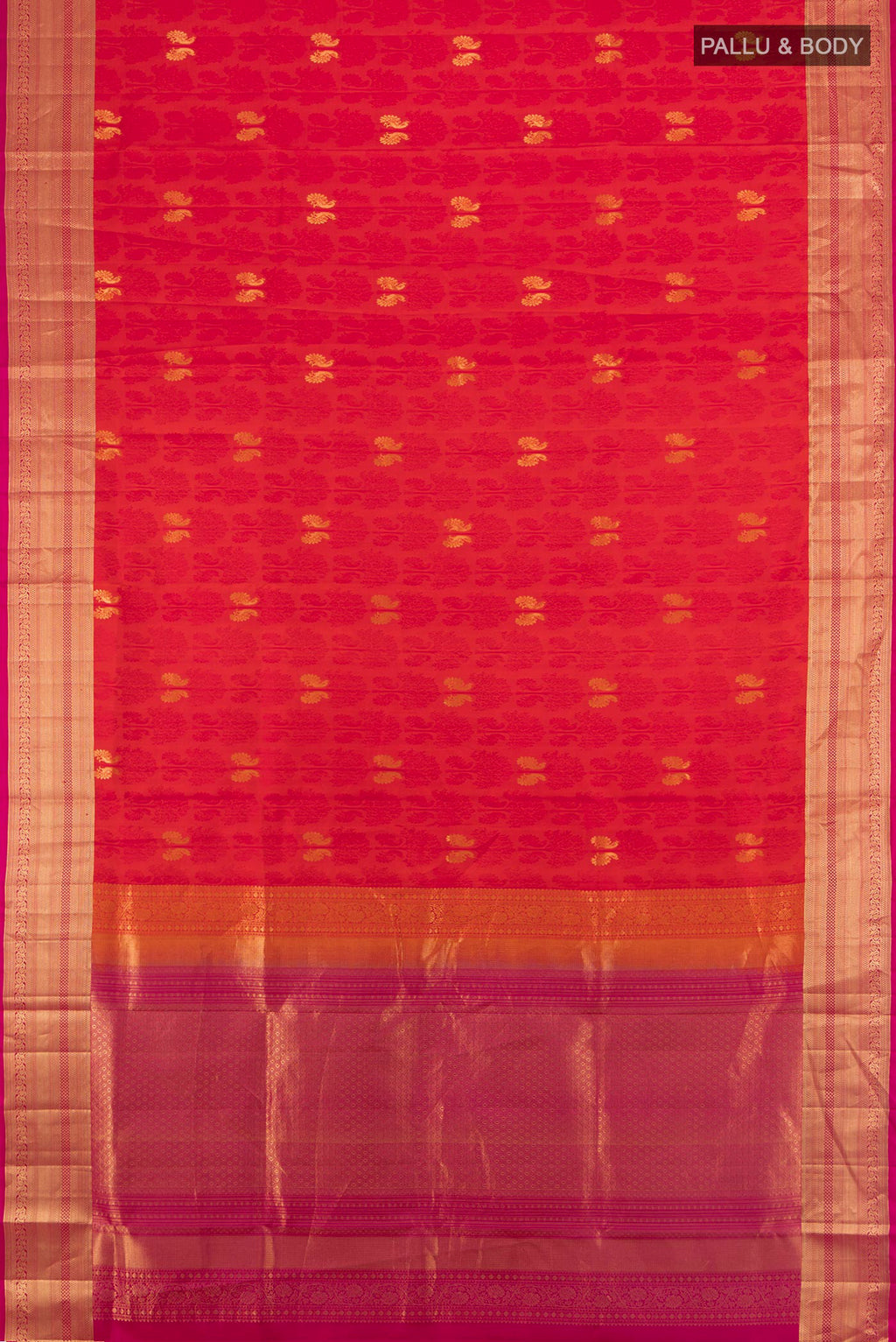 Flat view of Pure Silk Brick Orange Soft Saree with Jacquard design on the body and Zari Border. 
