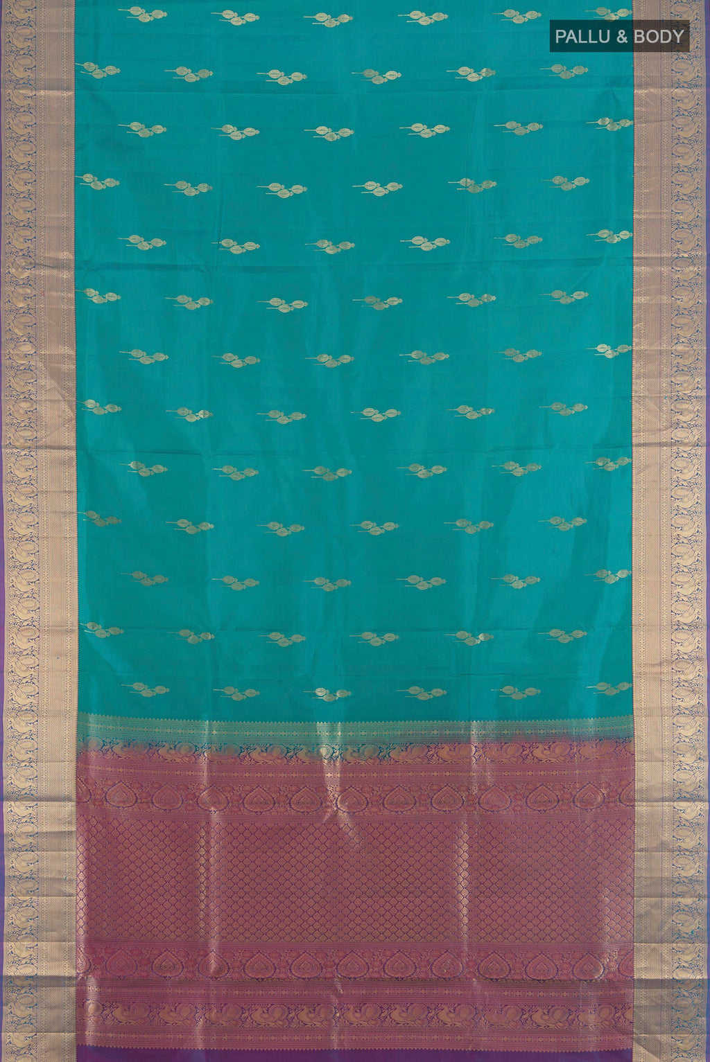 Flat view of Pure Silk Peacock Blue Soft Saree with Zari Butta on the body and Zari Border. 