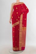 Pure Silk Red Soft Saree with Zari Butta on the body and Silk Border.  displayed on a mannequin