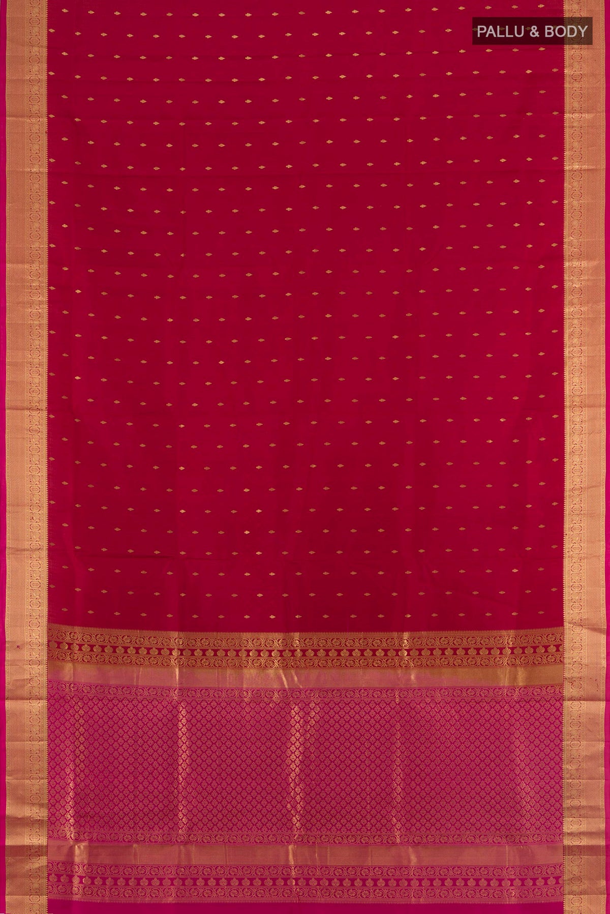 Flat view of Pure Silk Red Soft Saree with Zari Butta on the body and Zari Border. 