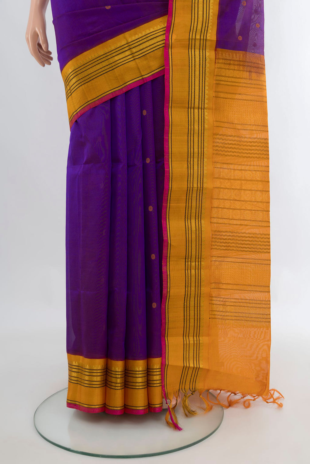 Pleats and pallu of Purple Silk Cotton Saree with Thread Butta on the body and Zari Border. 