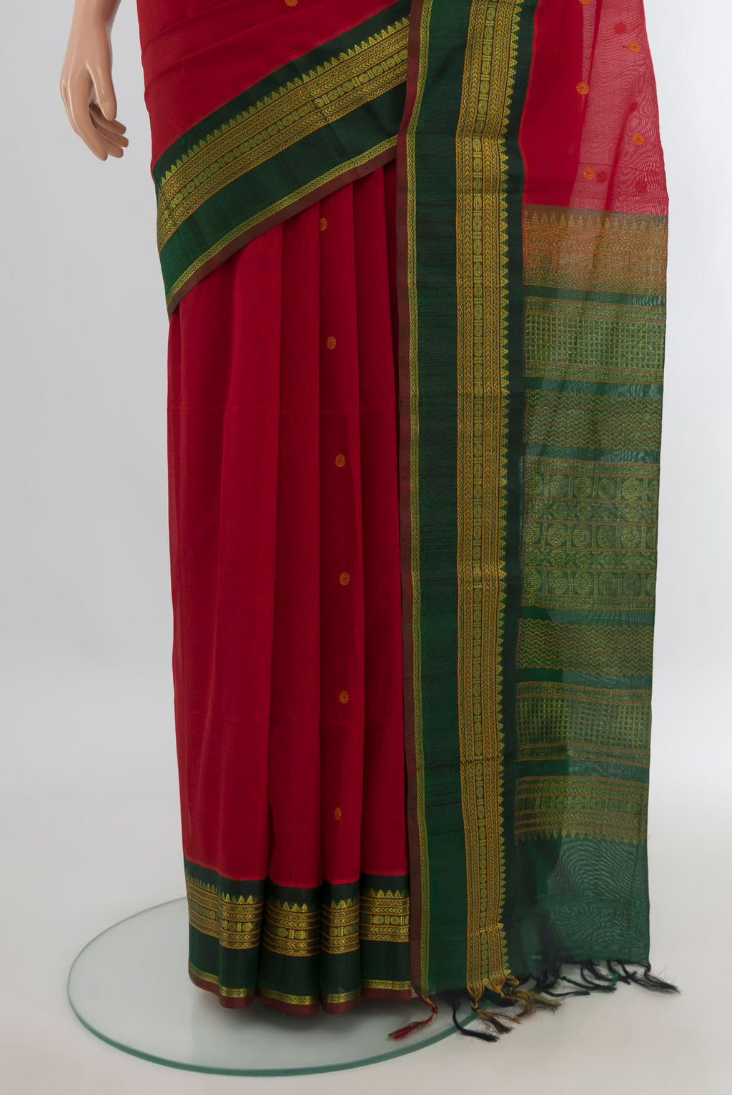 Pleats and pallu of Red Silk Cotton Saree with Thread Brocade on the body and Zari Border. 