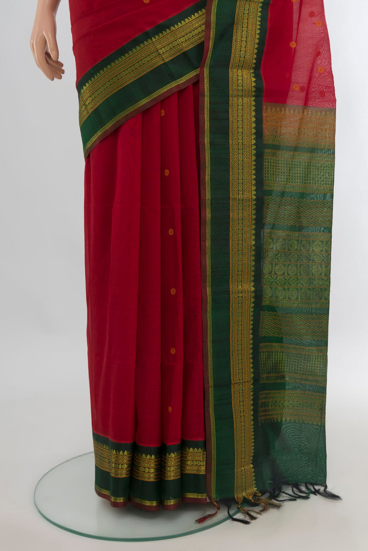Pleats and pallu of Red Silk Cotton Saree with Thread Brocade on the body and Zari Border. 