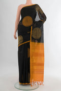 Black Silk Cotton Saree with Zari And Thread Butta on the body and Plain Border.  displayed on a mannequin
