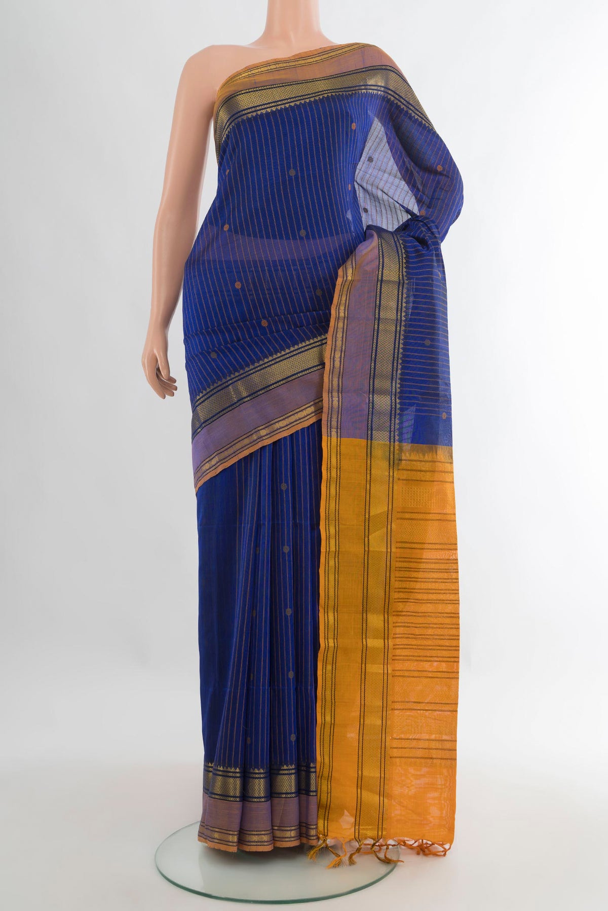 Blue Silk Cotton Saree with Stripes on the body and Zari Border.  displayed on a mannequin