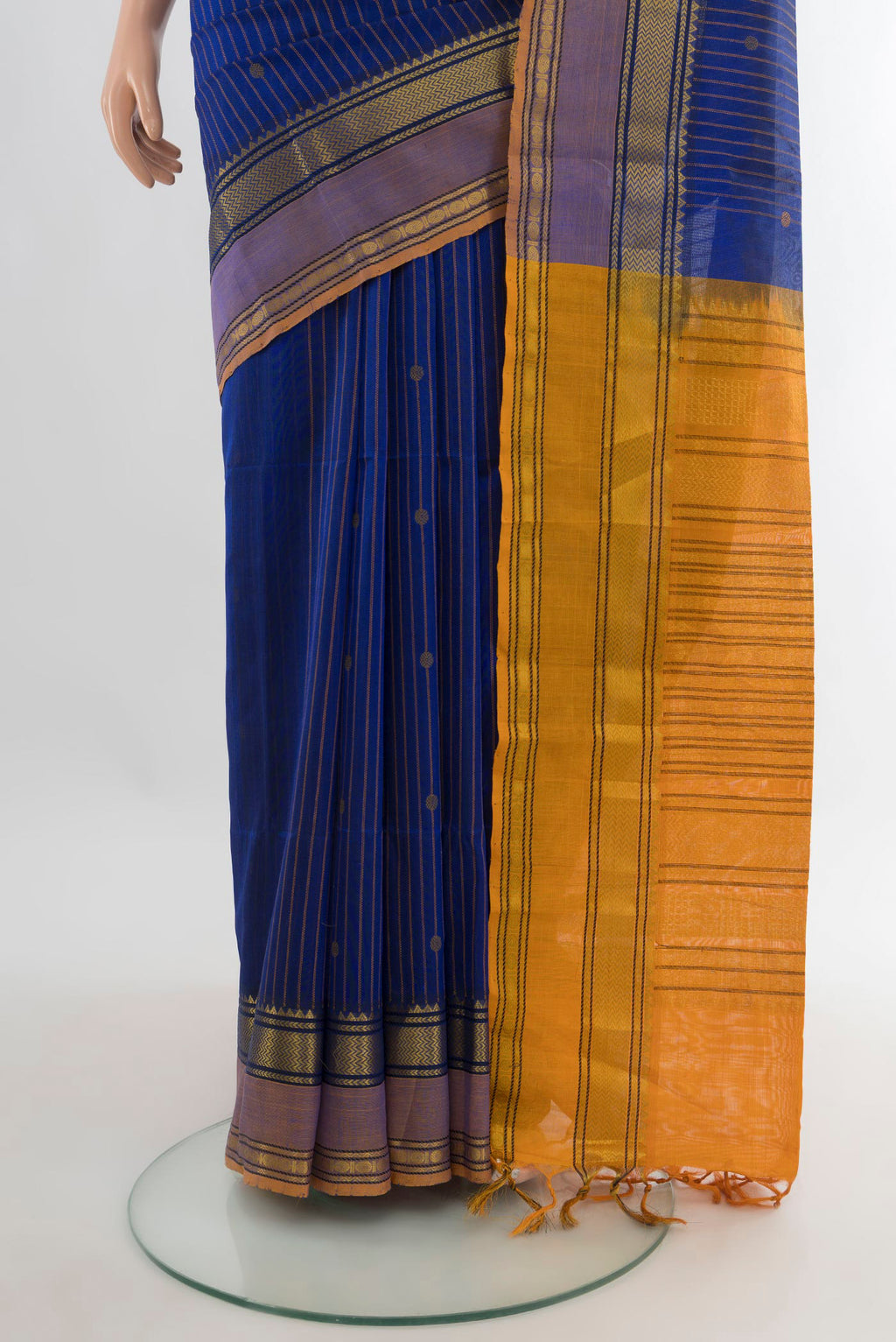 Pleats and pallu of Blue Silk Cotton Saree with Stripes on the body and Zari Border. 