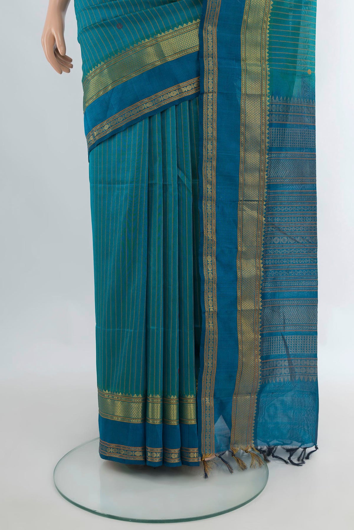 Pleats and pallu of Sea Green Silk Cotton Saree with Thread Butta on the body and Zari Border. 