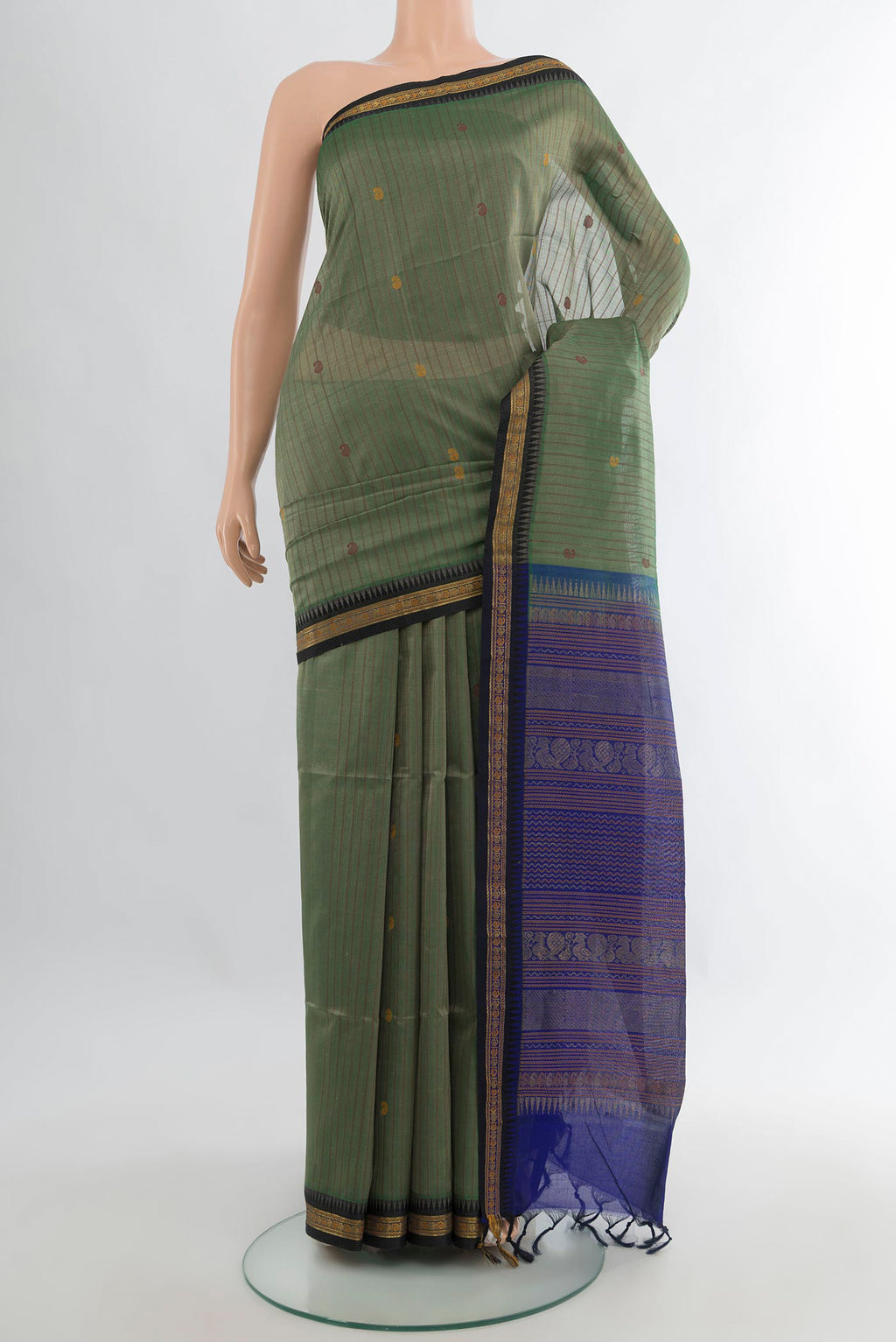 Sage Green Silk Cotton Saree with Stripes on the body and Zari Border.  displayed on a mannequin