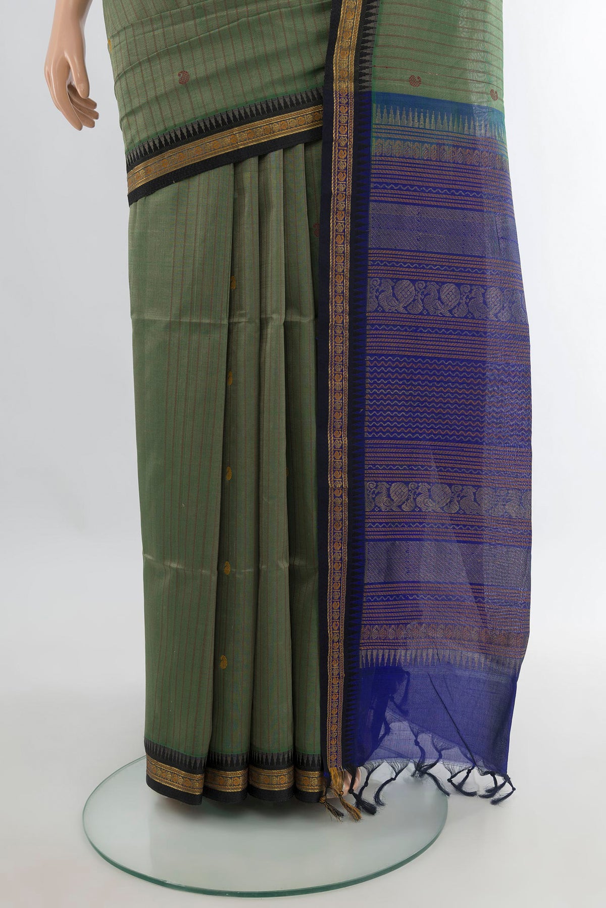 Pleats and pallu of Sage Green Silk Cotton Saree with Stripes on the body and Zari Border. 