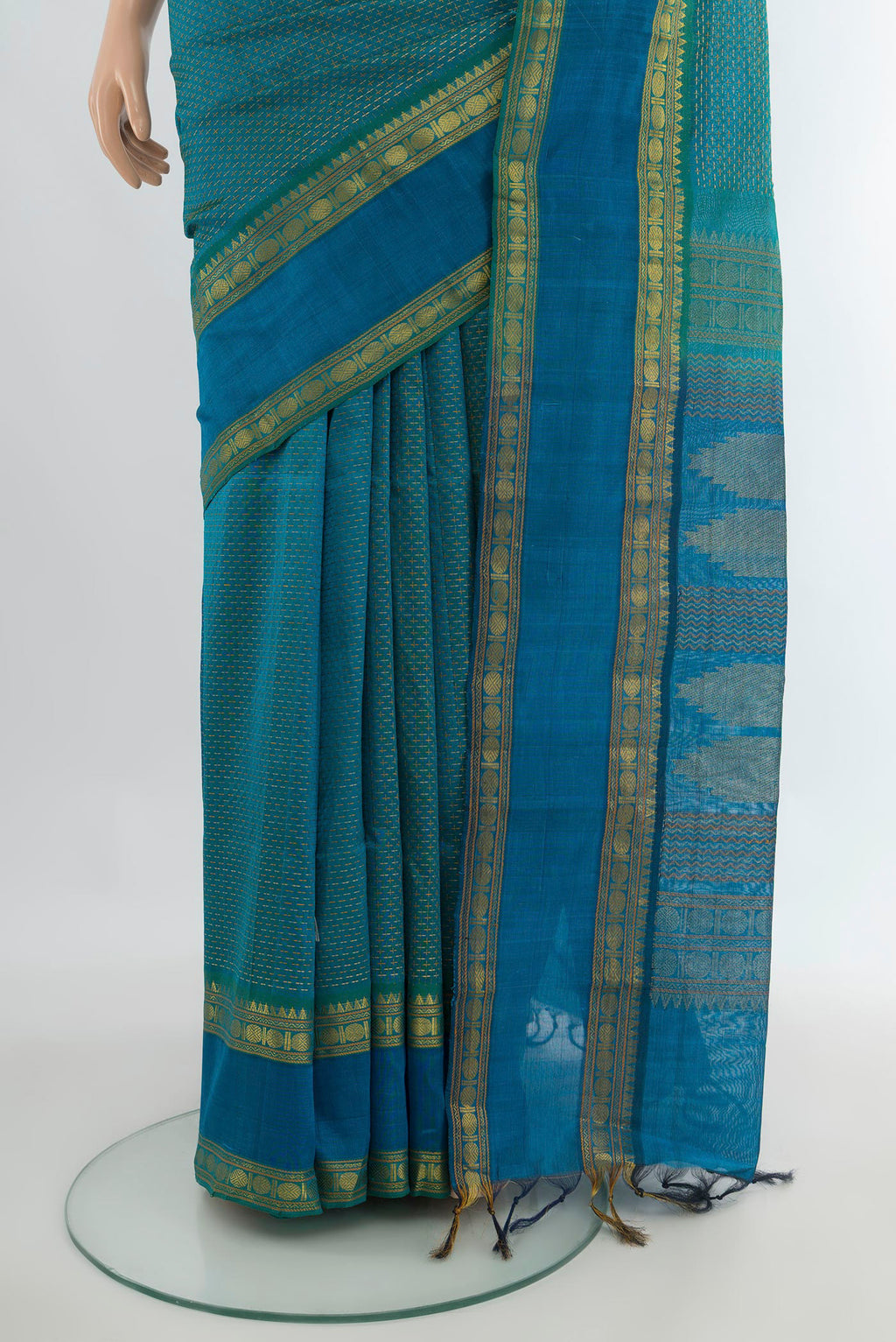 Pleats and pallu of Sea Green Silk Cotton Saree with Thread Butta on the body and Zari Border. 
