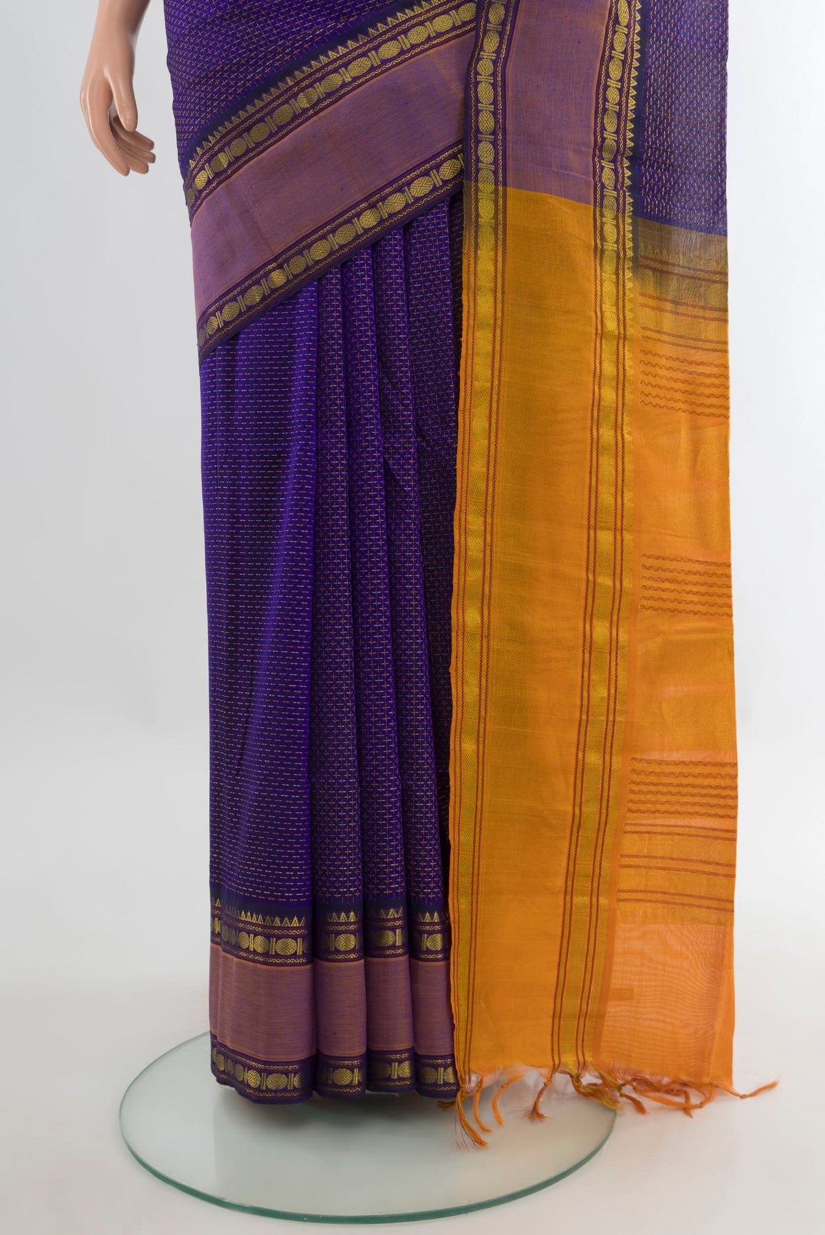 Pleats and pallu of Violet Silk Cotton Saree with Checked design on the body and Zari Border. 