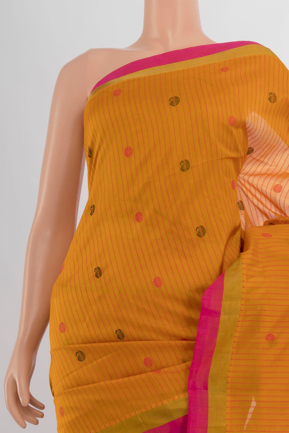 Border image of Yellow Silk Cotton Saree with Zari Butta on the body and Silk Border. 