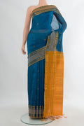 Blue Silk Cotton Saree with Thread Butta on the body and Zari Border.  displayed on a mannequin