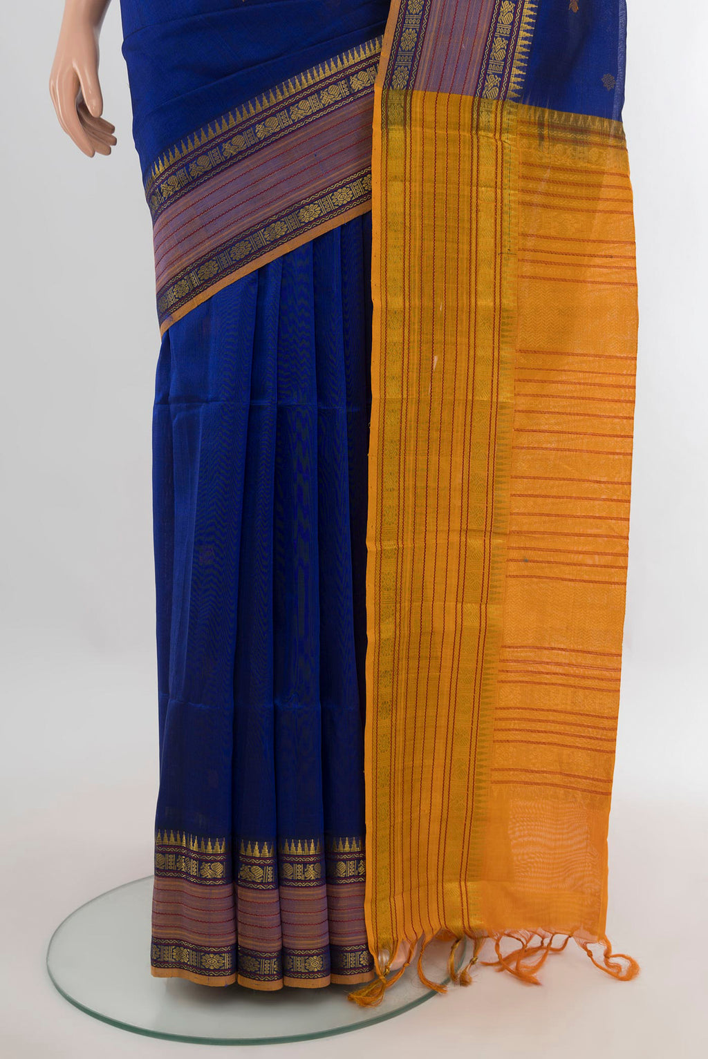 Pleats and pallu of Dark Blue Silk Cotton Saree with Thread Butta on the body and Zari Border. 