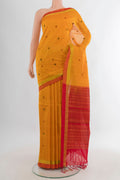 Mustard Silk Cotton Saree with Stripes on the body and Plain Border.  displayed on a mannequin