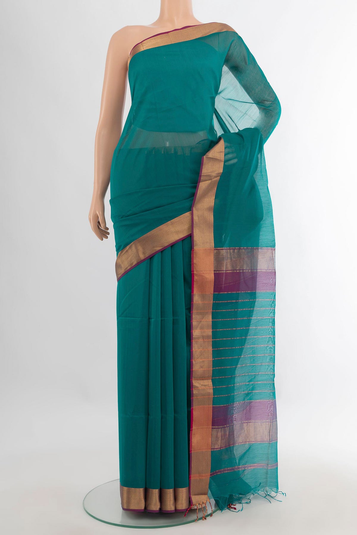 Teal Maheshwari Cotton Saree with Plain Body and Zari Border.  displayed on a mannequin