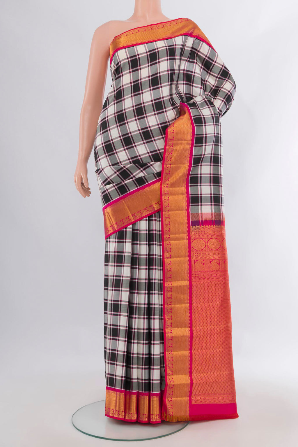 Pure Silk Multi Color Kanchipuram Saree with Checked design on the body and Zari Border.  displayed on a mannequin
