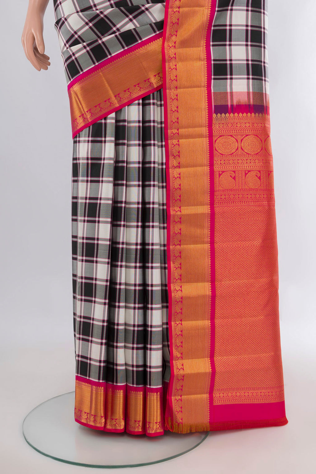 Pleats and pallu of Pure Silk Multi Color Kanchipuram Saree with Checked design on the body and Zari Border. 