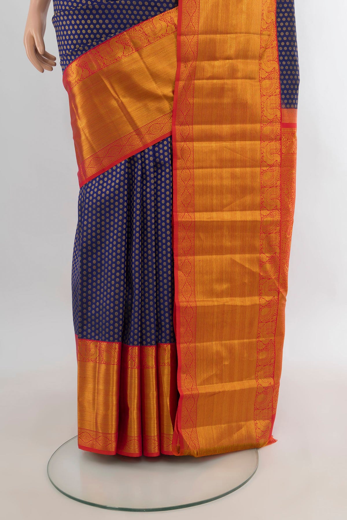 Pleats and pallu of Pure Silk Navy Blue Kanjivaram Saree with Zari Butta on the body and Zari Border. 