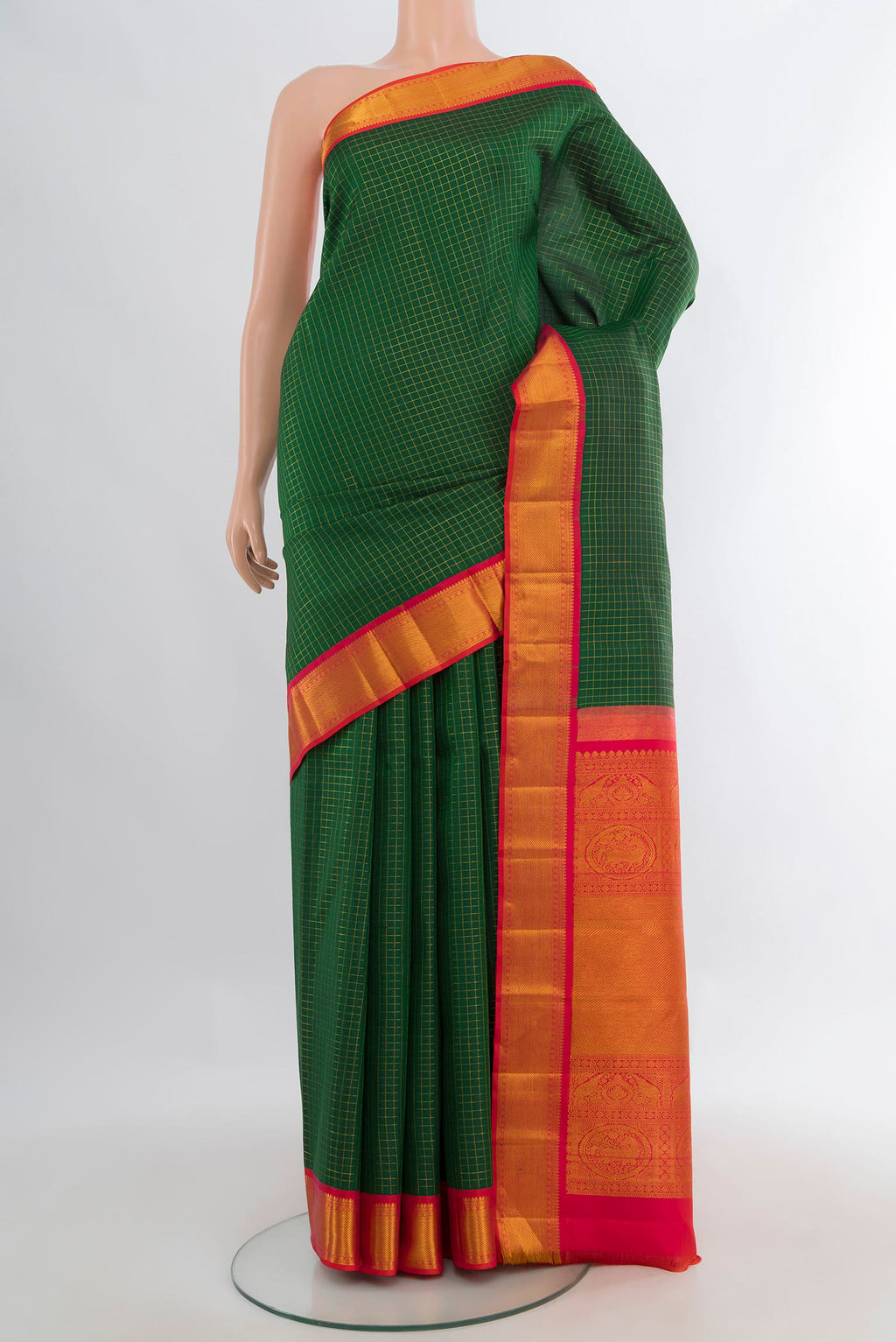 Pure Silk Bottle Green Kanchipuram Saree with Checked design on the body and Zari Border.  displayed on a mannequin