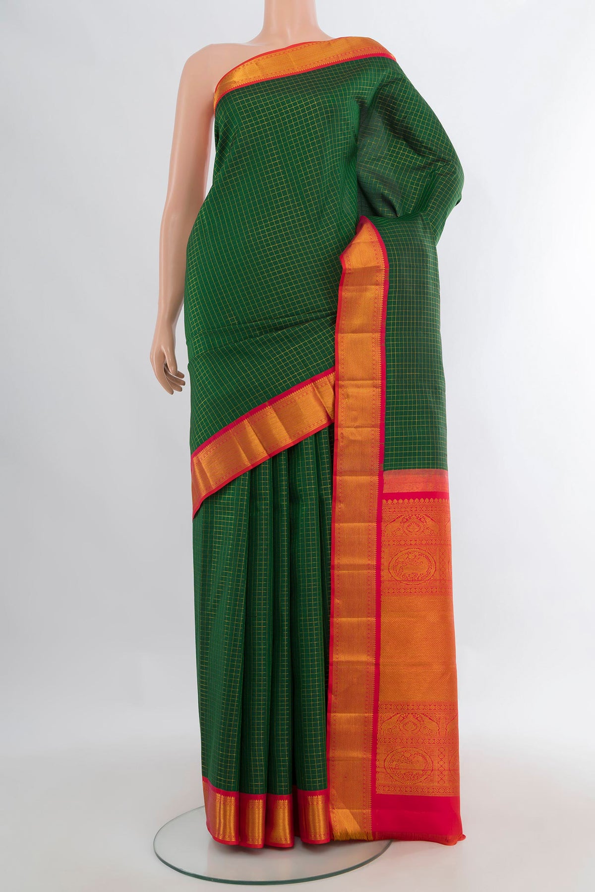 Pure Silk Bottle Green Kanchipuram Saree with Checked design on the body and Zari Border.  displayed on a mannequin