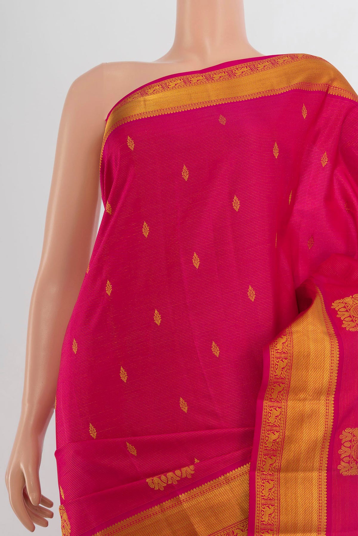 Border image of Pure Silk Rani Pink Kanchipuram Saree with Zari Butta on the body and Silk Border. 