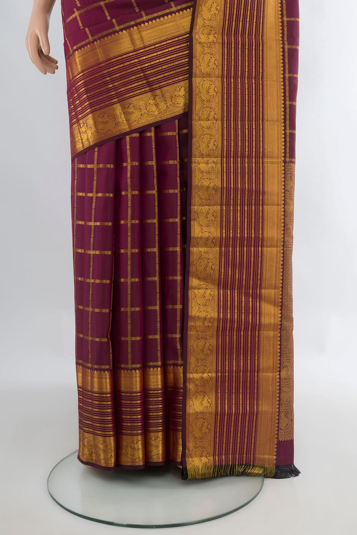 Pleats and pallu of Pure Silk Coffee Brown Kanchipuram Saree with Checked design on the body and Zari Border. 