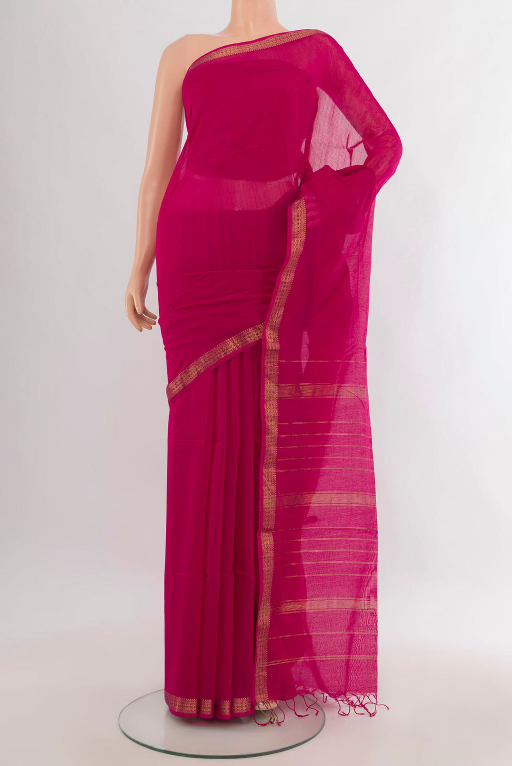 Pink Maheshwari Cotton Saree with Plain Body and Zari Border.  displayed on a mannequin