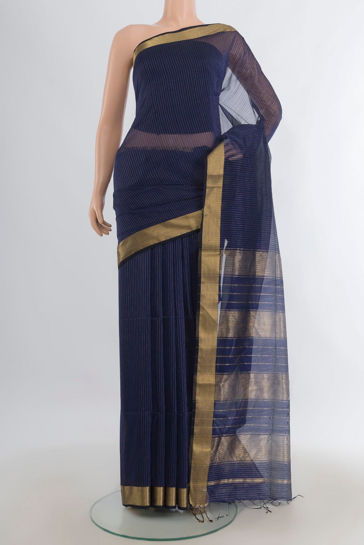 Navy Blue Maheshwari Cotton Saree with Stripes on the body and Zari Border.  displayed on a mannequin
