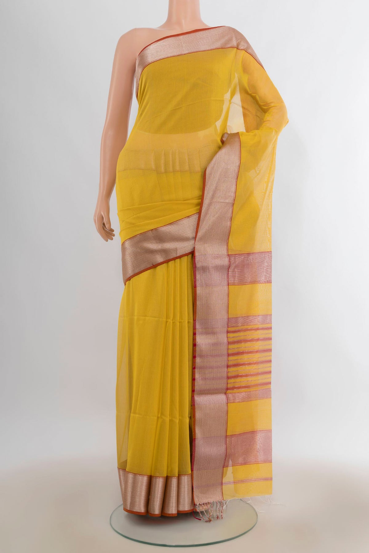 Lemon Yellow Maheshwari Cotton Saree with Zari Butta on the body and Zari Border.  displayed on a mannequin
