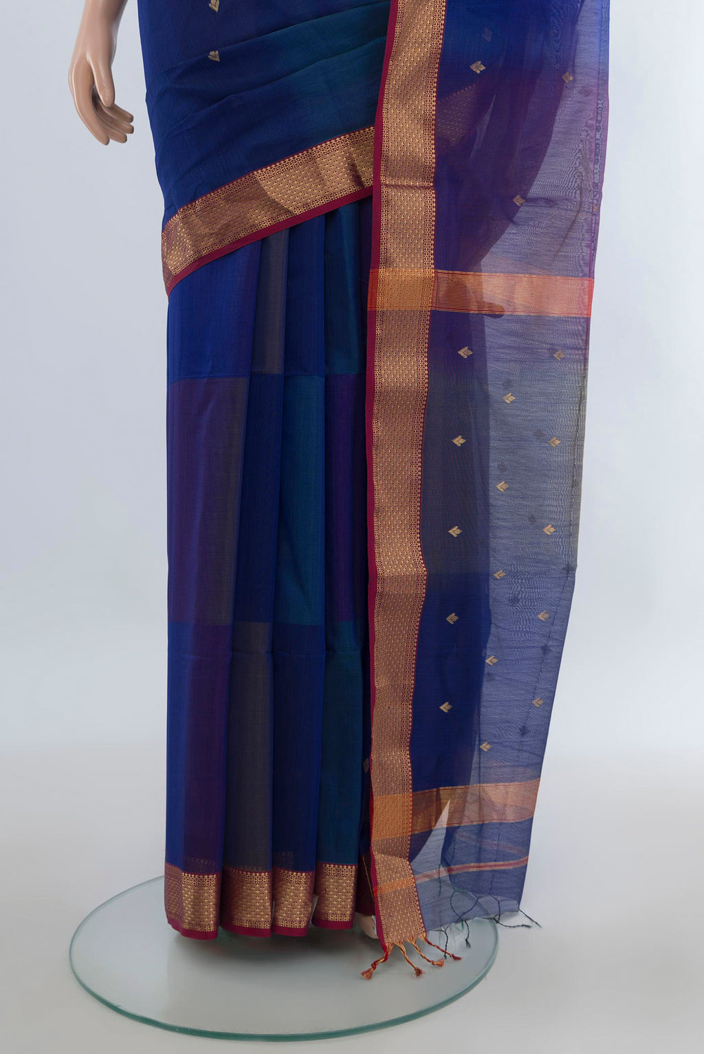 Pleats and pallu of Royal Blue Maheshwari Cotton Saree with Zari Butta on the body and Zari Border. 