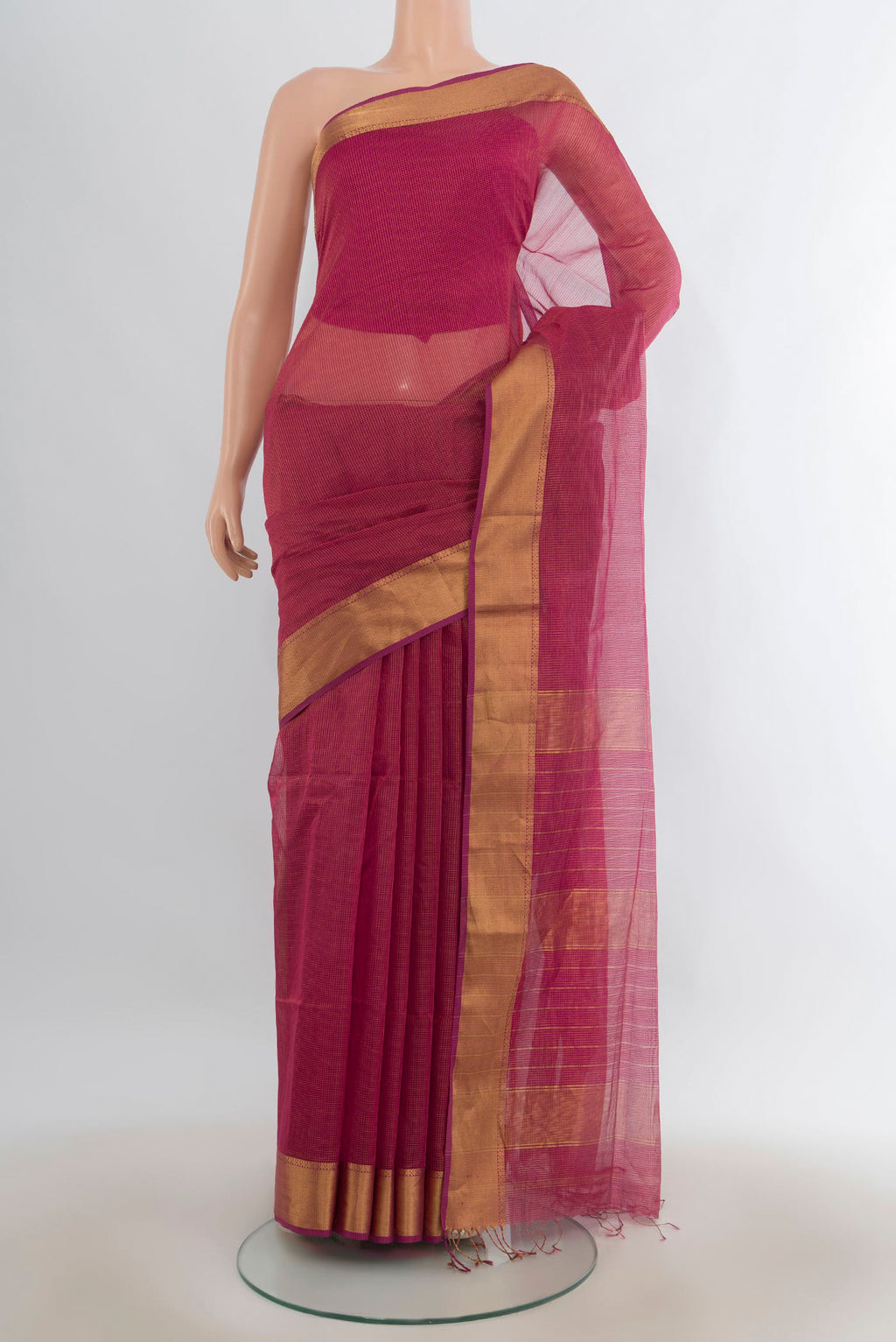 Pink Maheshwari Cotton Saree with Checked design on the body and Zari Border.  displayed on a mannequin
