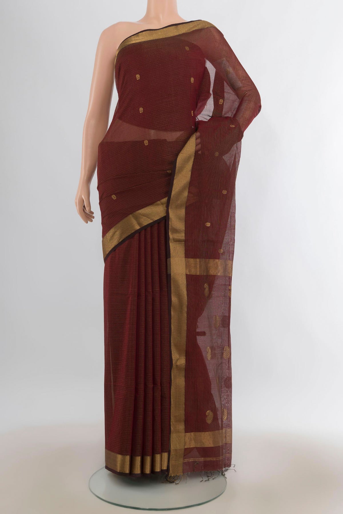 Coffee Brown Maheshwari Cotton Saree with Zari Butta on the body and Zari Border.  displayed on a mannequin