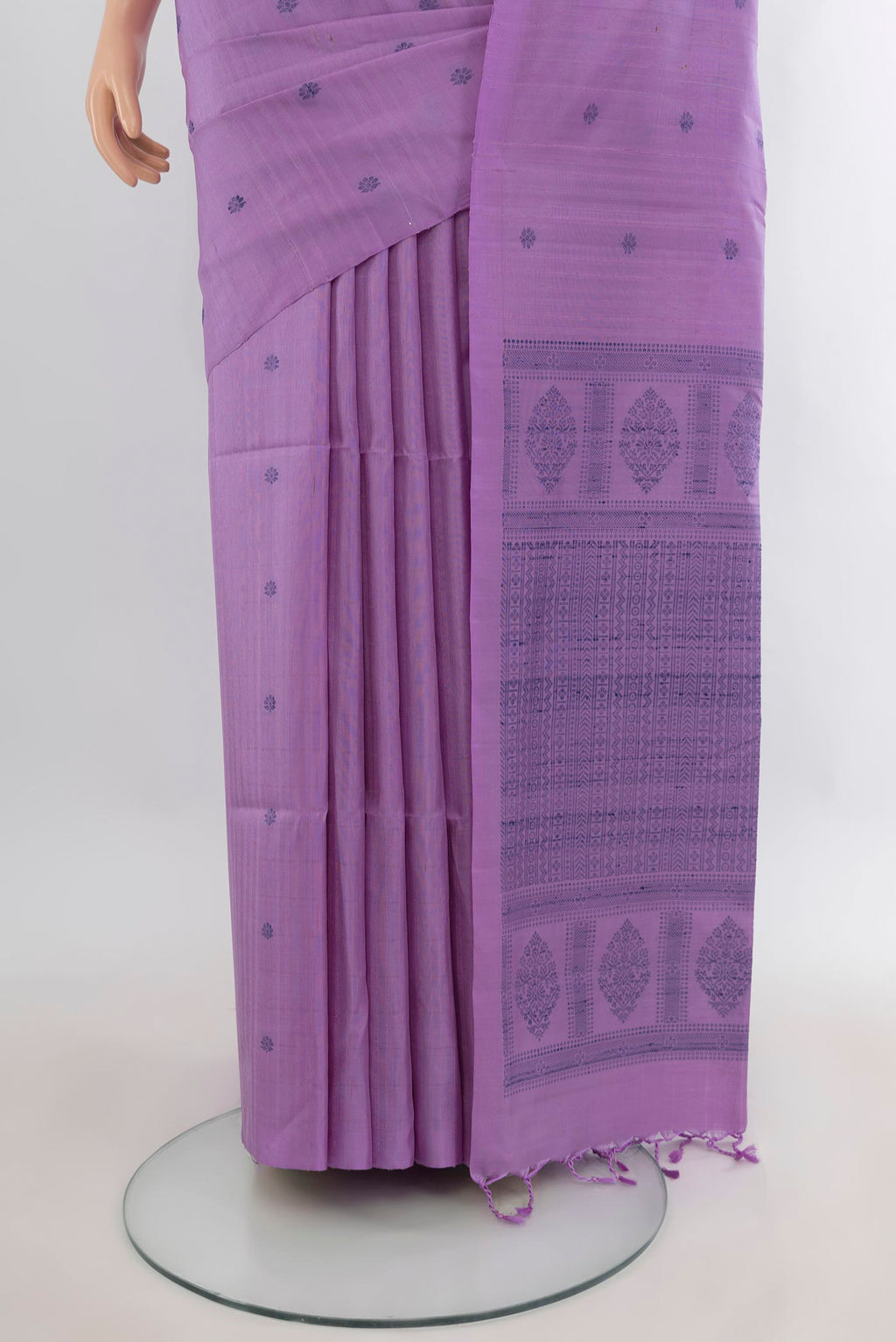 Pleats and pallu of Pure Silk Lavender Soft Saree with Thread Butta on the body and Without Border. 