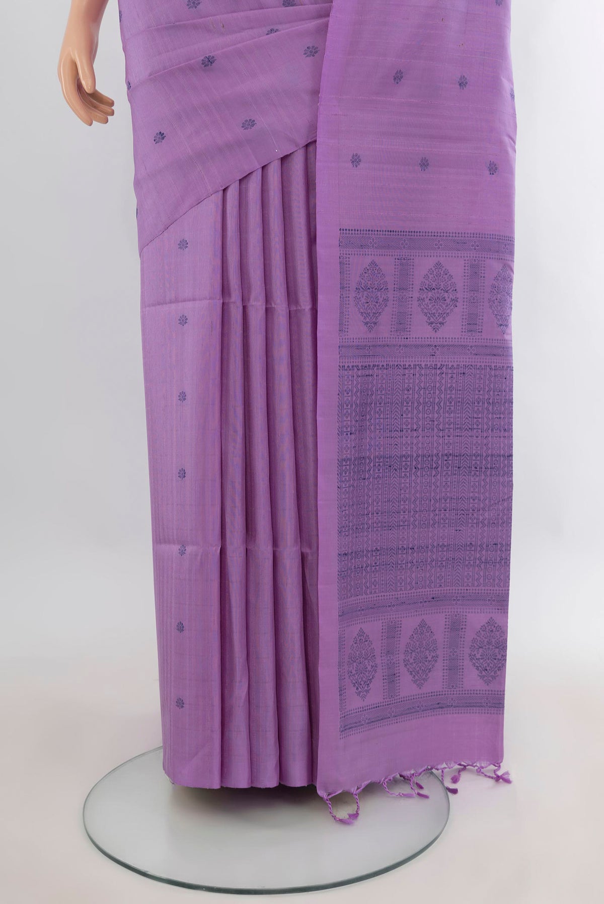 Pleats and pallu of Pure Silk Lavender Soft Saree with Thread Butta on the body and Without Border. 