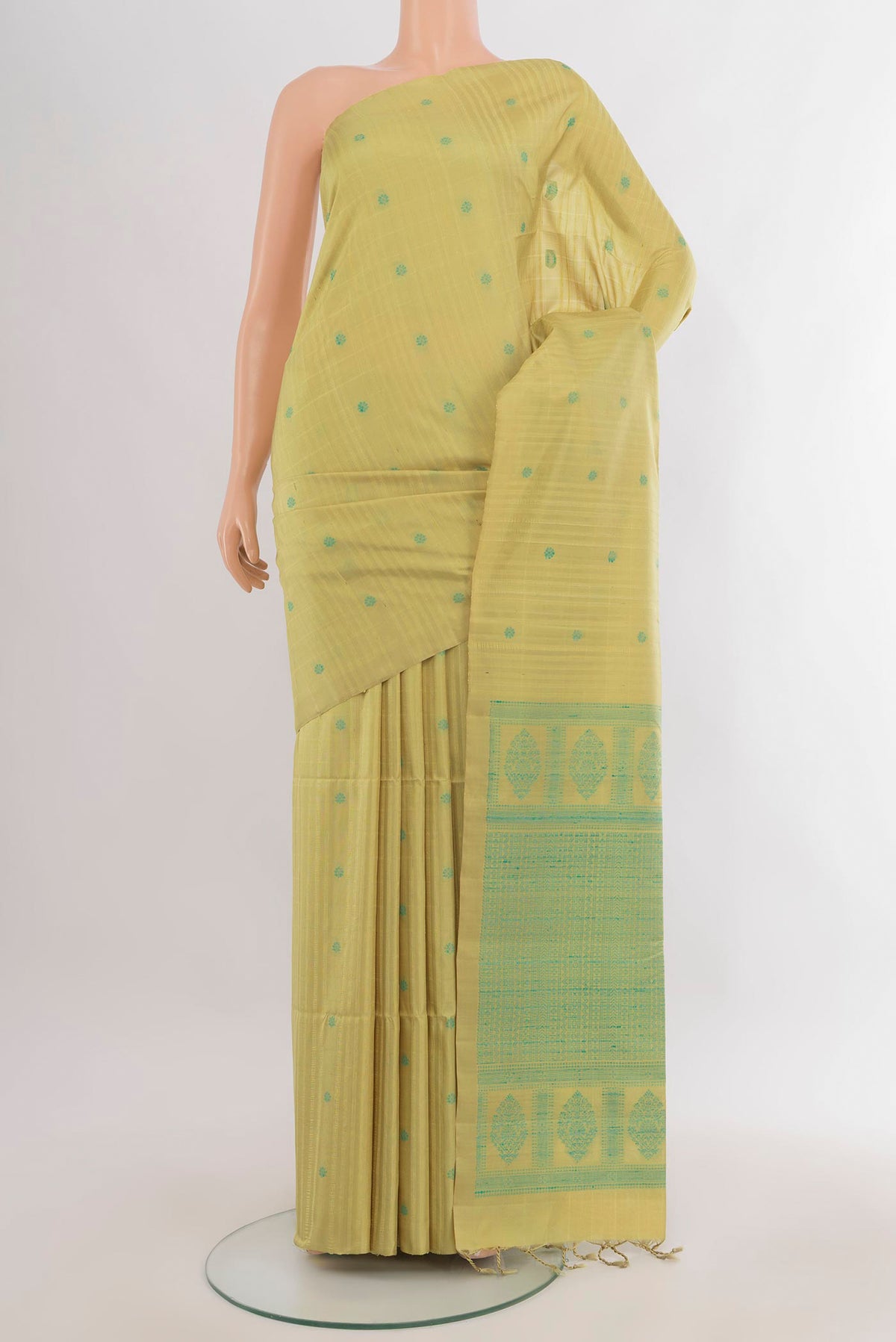 Pure Silk Lemon Yellow Soft Saree with Thread Butta on the body and Without Border.  displayed on a mannequin