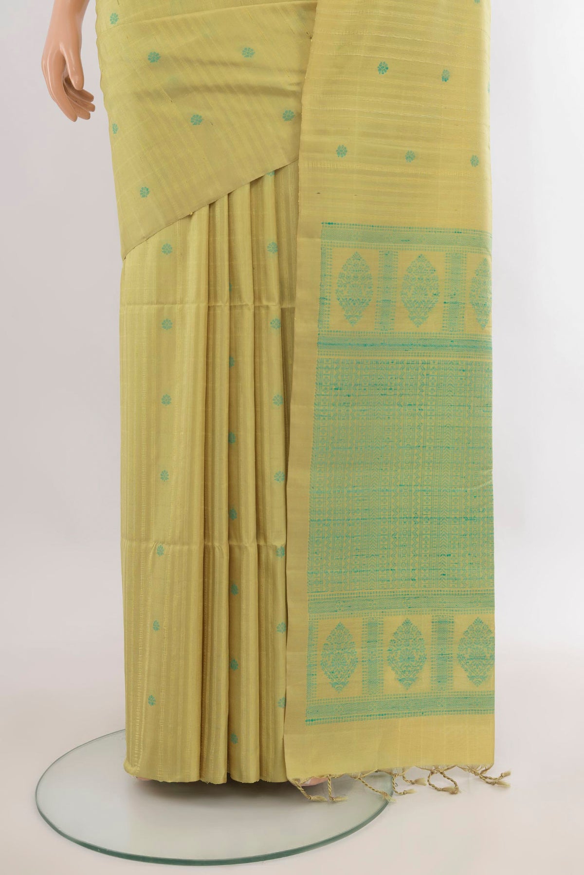 Pleats and pallu of Pure Silk Lemon Yellow Soft Saree with Thread Butta on the body and Without Border. 