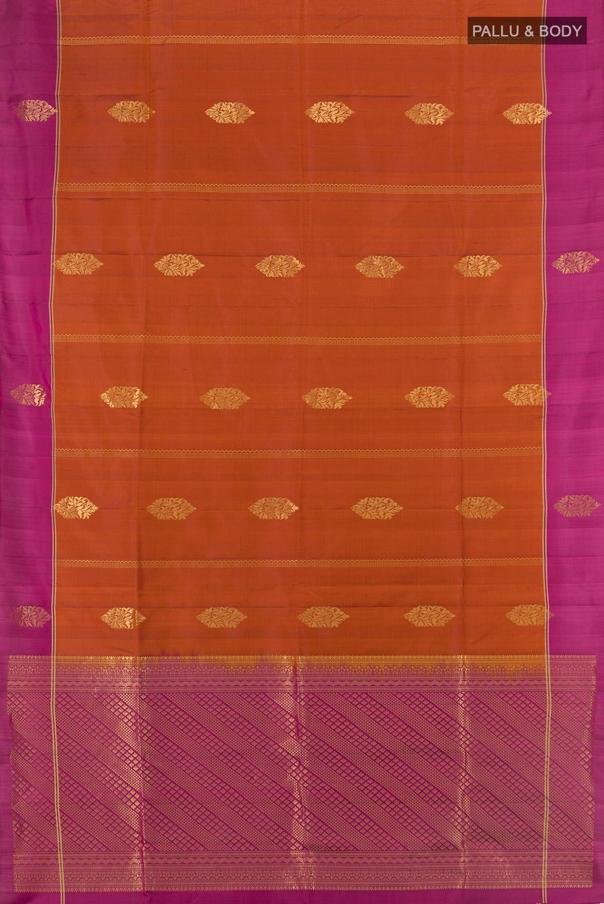 Flat view of Pure Silk Rust Soft Saree with Zari Butta on the body and Plain Border. 