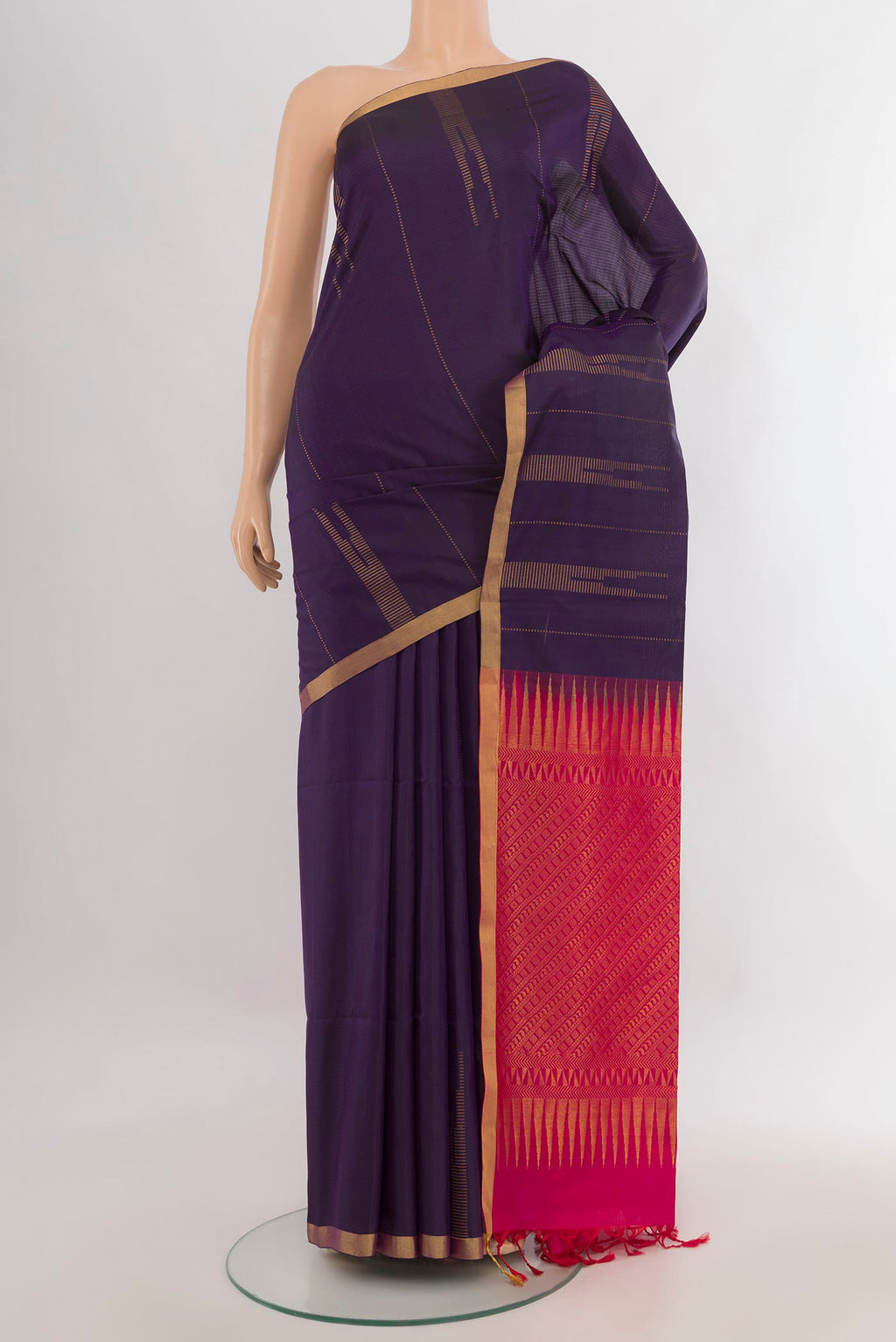Pure Silk Navy Blue Soft Saree with Zari Butta on the body and Zari Border.  displayed on a mannequin