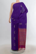 Pure Silk Violet Soft Saree with Zari Butta on the body and Without Border.  displayed on a mannequin