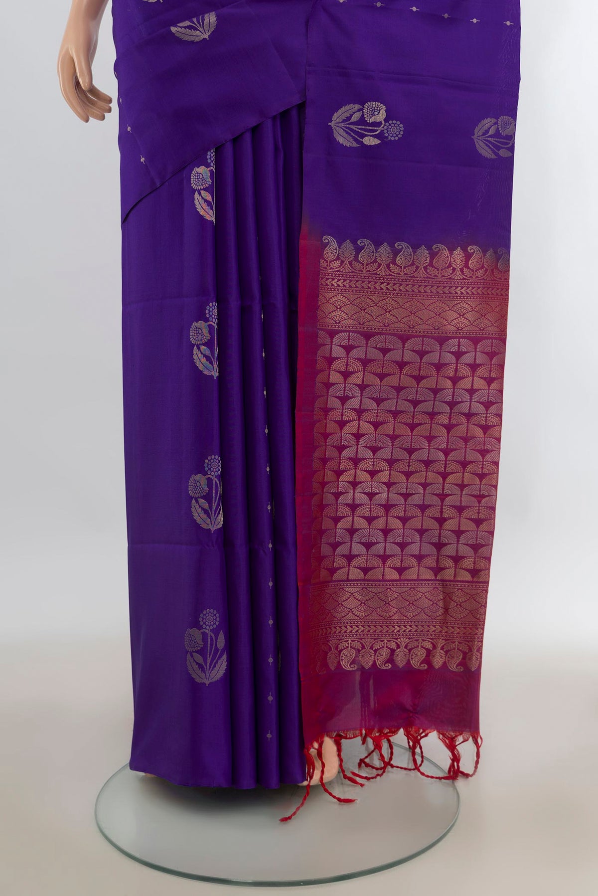 Pleats and pallu of Pure Silk Violet Soft Saree with Zari Butta on the body and Without Border. 