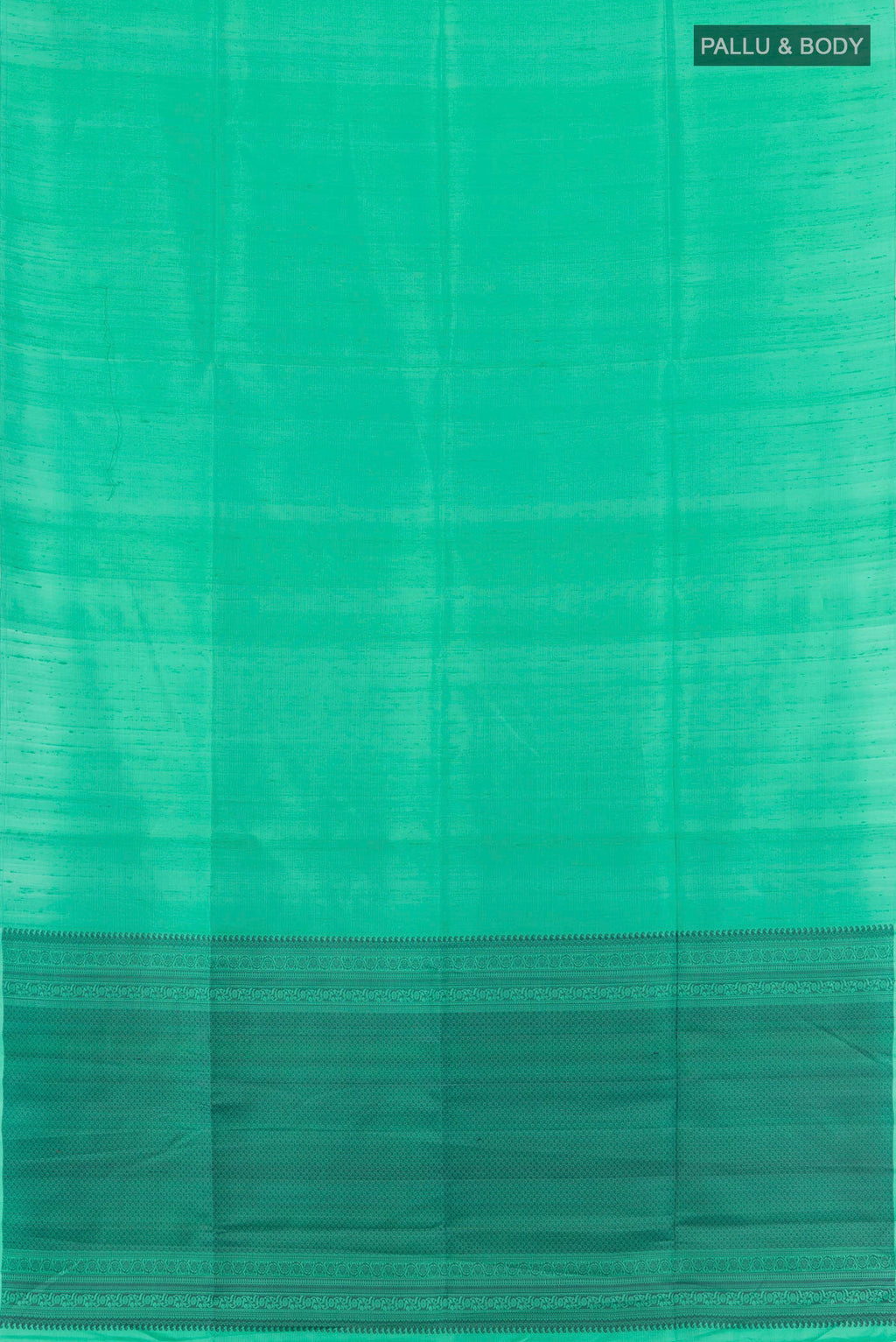 Flat view of Pure Silk Green Soft Saree with Plain Body and Without Border. 