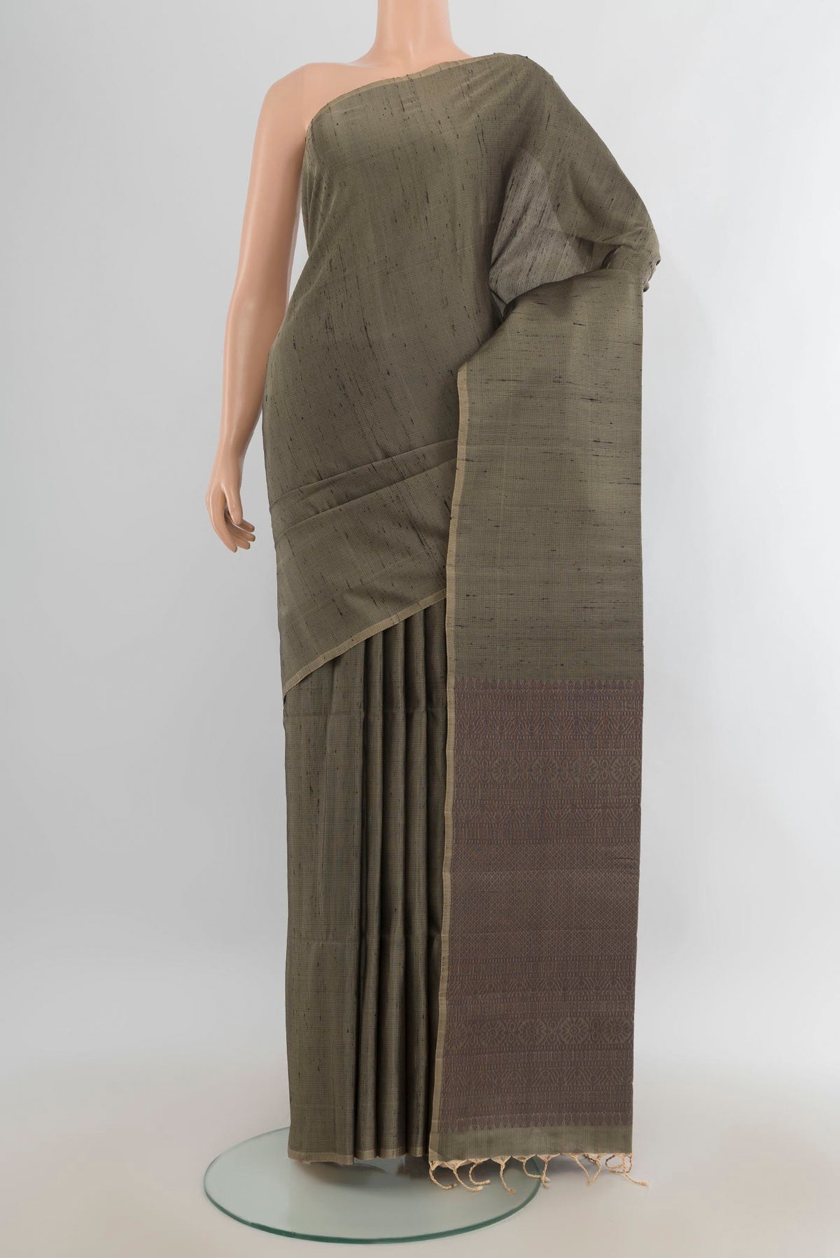 Pure Silk Burgundy Soft Saree with Zari Butta on the body and Silk Border.  displayed on a mannequin