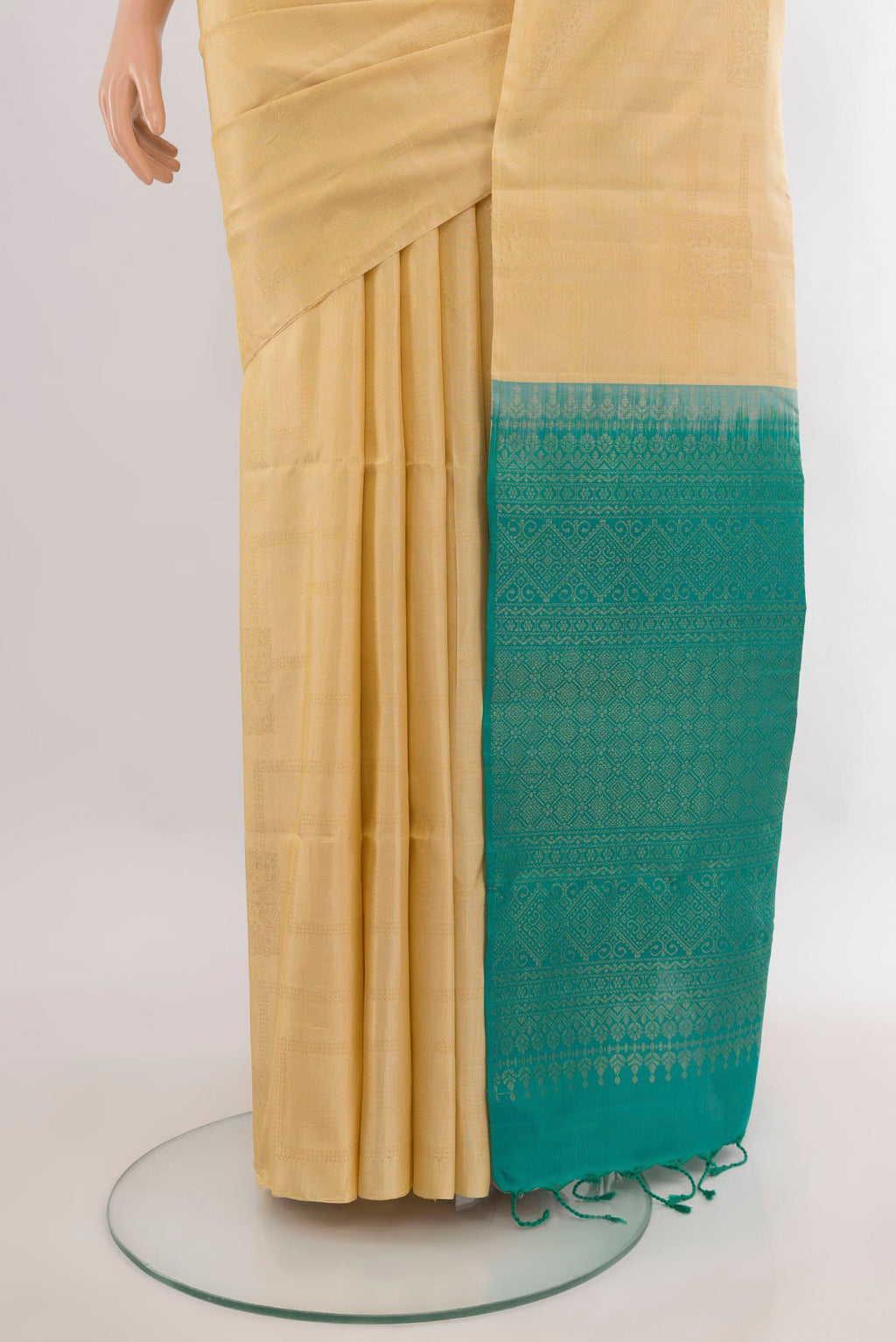 Pleats and pallu of Pure Silk Sandal Soft Saree with Zari Butta on the body and Without Border. 