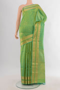 Pure Silk Light Green Soft Saree with Checked design on the body and Zari Border.  displayed on a mannequin