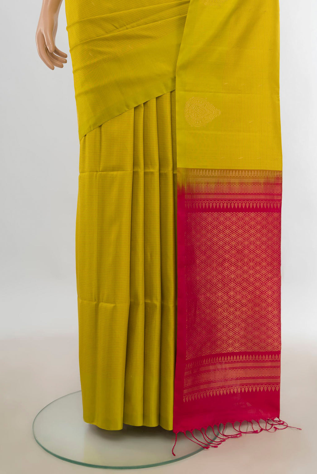 Pleats and pallu of Pure Silk Light Green Soft Saree with Zari Butta on the body and Silk Border. 