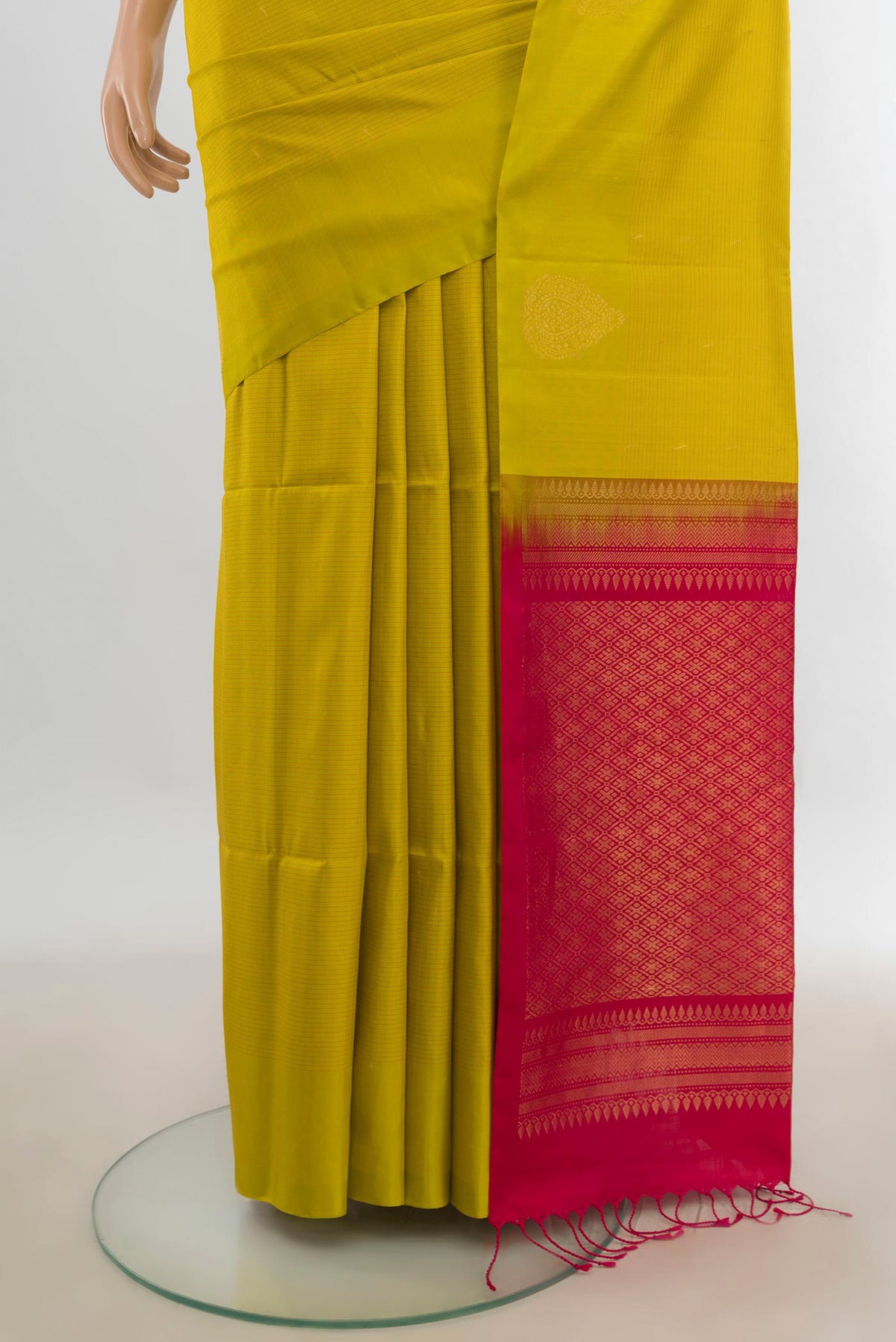 Pleats and pallu of Pure Silk Light Green Soft Saree with Zari Butta on the body and Silk Border. 