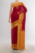 Pure Silk Red Soft Saree with Zari Butta on the body and Zari Border.  displayed on a mannequin