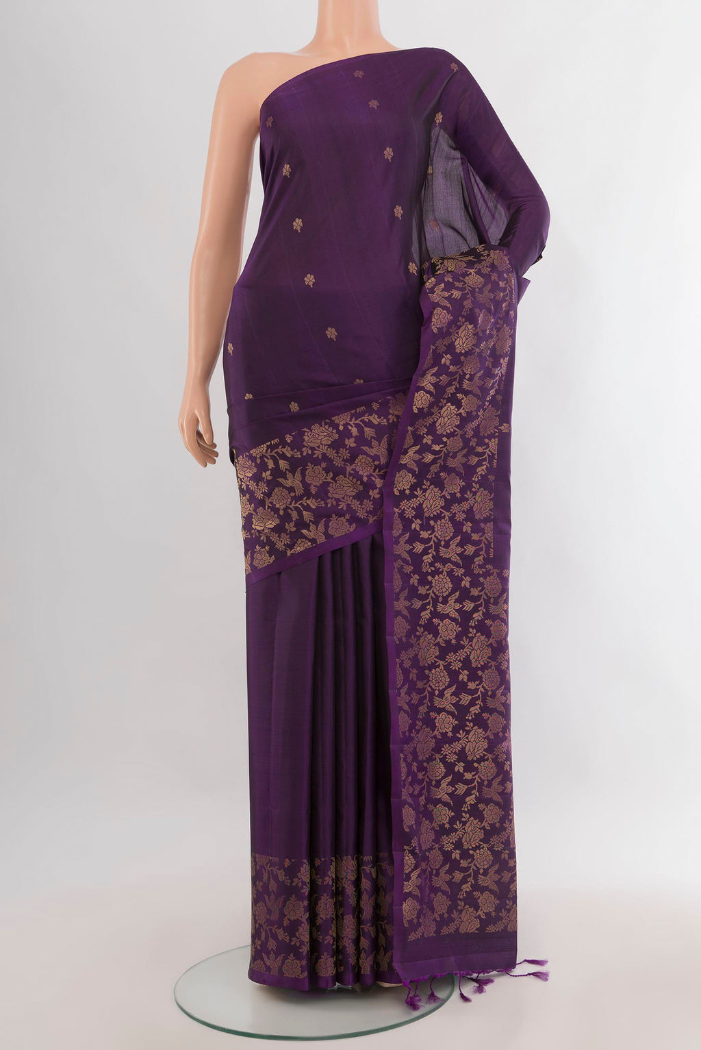 Pure Silk Violet Soft Saree with Zari Butta on the body and Fancy Border.  displayed on a mannequin