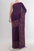 Pure Silk Violet Soft Saree with Zari Butta on the body and Fancy Border.  displayed on a mannequin